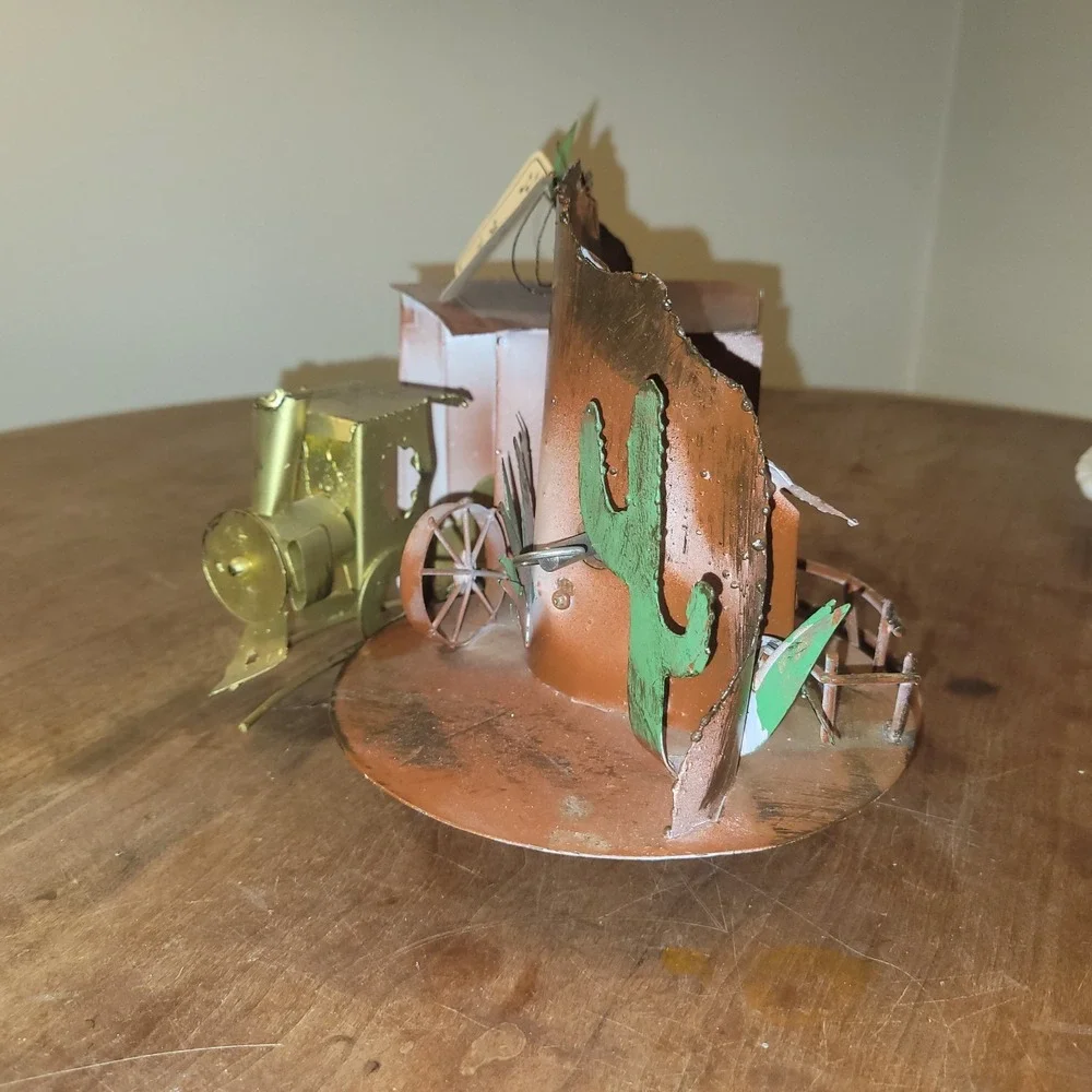 Oxidized‎ Copper Train Moves in Circles - Music Box Works